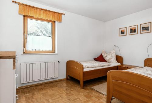 Postel nebo postele na pokoji v ubytování Apartment Fritz