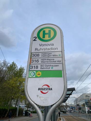 a sign for a gas station on a street at Ferienwohnung am Stadion Bochum Grumme in Bochum