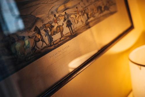 a picture of a painting on a wall at Palazzo Romani Adami in Fermo