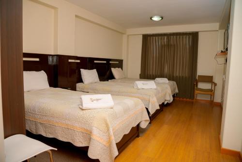 Postel nebo postele na pokoji v ubytování Hotel San Román ⋆⋆⋆