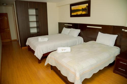 Postel nebo postele na pokoji v ubytování Hotel San Román ⋆⋆⋆
