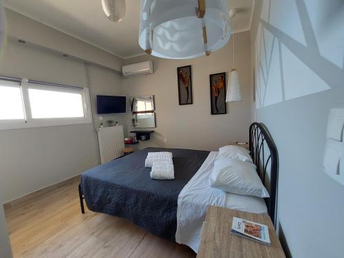 Postel nebo postele na pokoji v ubytování Nota apt 'vacation near the sea' 2