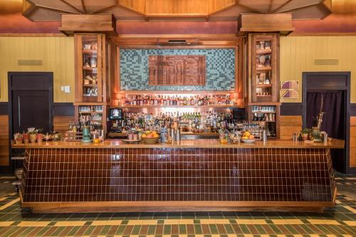 a bar at a restaurant with a brown counter at Freehand Los Angeles in Los Angeles
