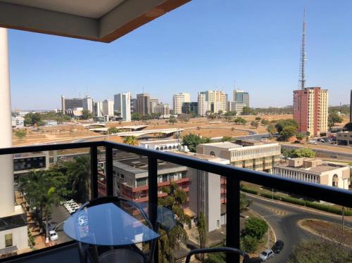 a view of a city from a balcony at ABC Apart Hotel in Brasilia