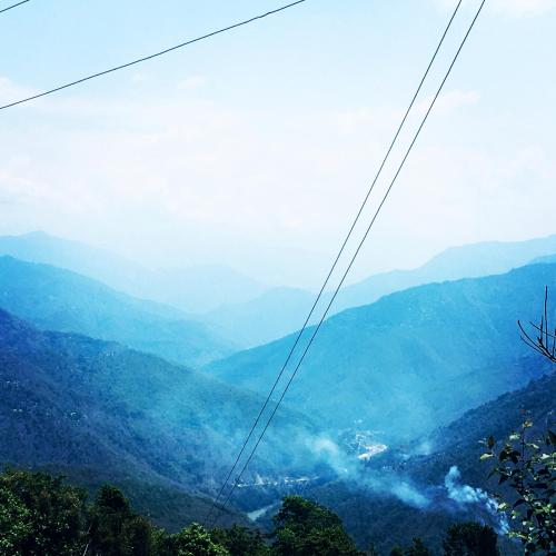 a view of a valley in the mountains at Quo Vadis Farm in Māngwa