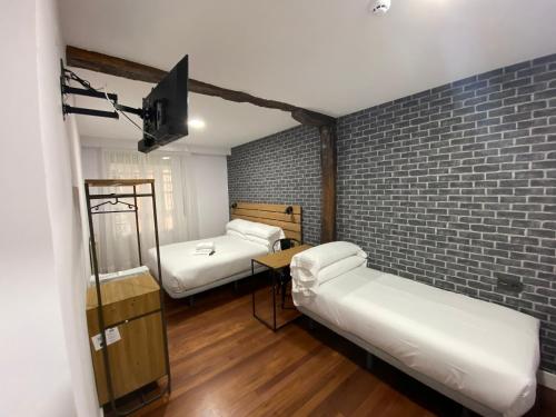 
Cama o camas de una habitación en Casual Mardones
