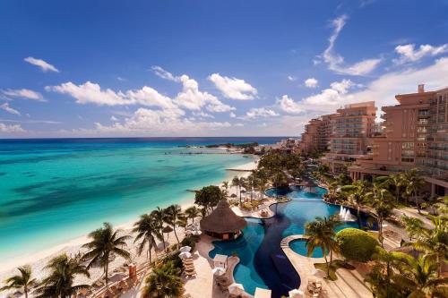 an aerial view of the beach and the ocean at Grand Fiesta Americana Coral Beach Cancun - All Inclusive in Cancún