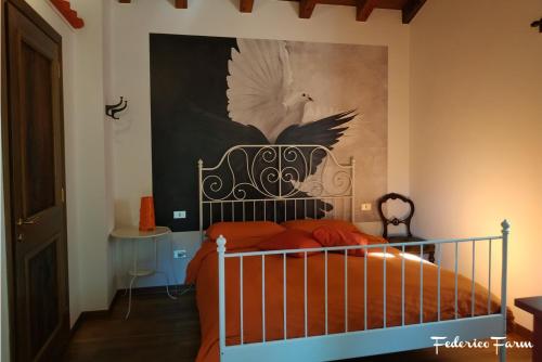 Cama o camas de una habitación en La Casa del Sarto - FedericoFarm