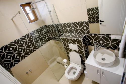 Bilik mandi di Apartments & Rooms ARCH