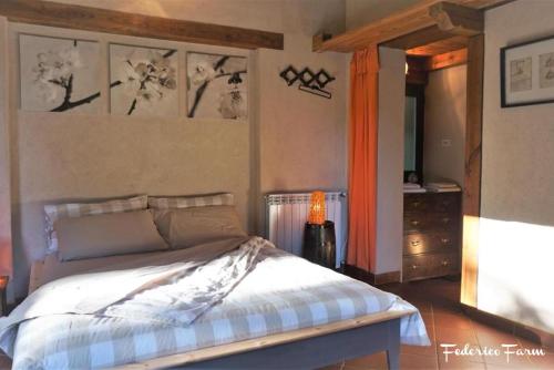 Cama o camas de una habitación en La Casa del Sarto - FedericoFarm