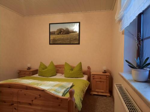 Postel nebo postele na pokoji v ubytování Das kleine, gemütliche Ferienhaus
