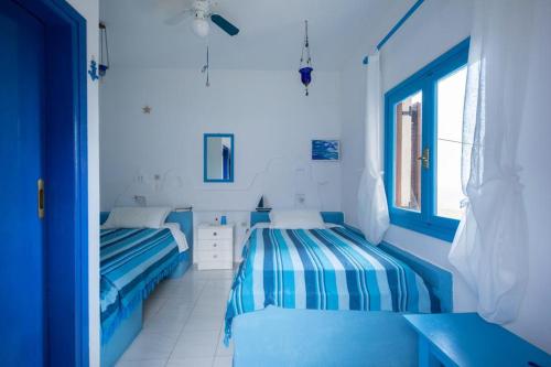 Postel nebo postele na pokoji v ubytování Casa Doria