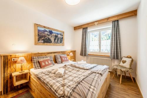 Postel nebo postele na pokoji v ubytování Laurino Apartment