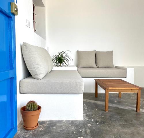a living room with a couch and a table at Can Marianet in Sant Ferran de Ses Roques