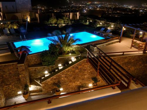 an image of a swimming pool at night at Secret Island in Tourlos