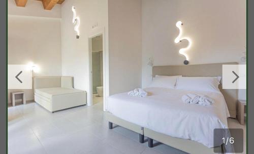 Una cama o camas en una habitación de Albergo Diffuso Amatrice