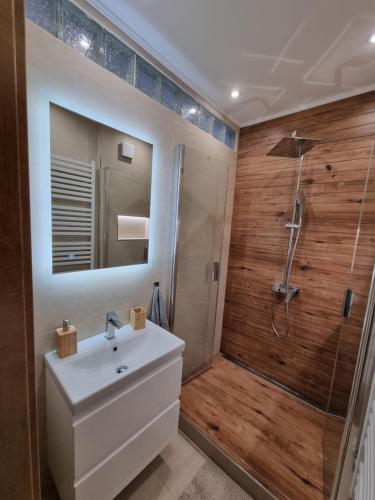 Ванна кімната в Apartmán Lomnický Štít