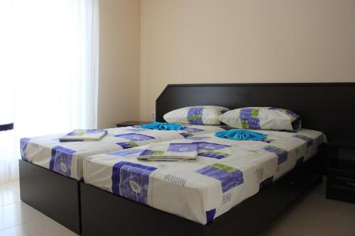 Cama o camas de una habitación en Belye Parusa Guest House