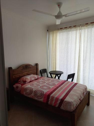 Letto o letti in una camera di Confortable casa vacacional en Carmen de Apicalá