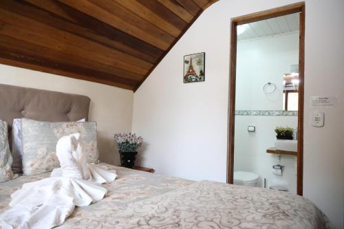 Postel nebo postele na pokoji v ubytování Casa do Papai