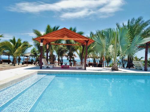 Bazén v ubytování Punta del Norte Bungalows nebo v jeho okolí