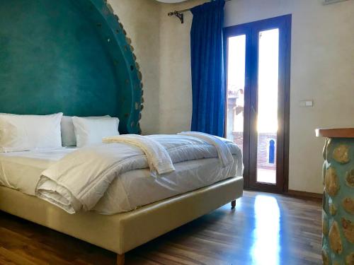 เตียงในห้องที่ Torre Hadra