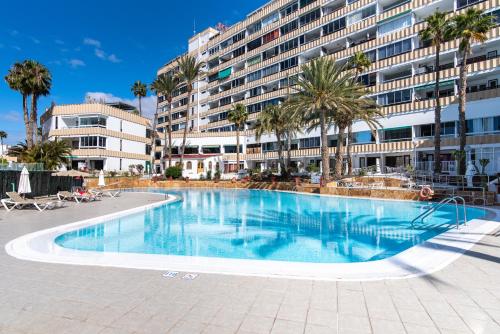 Bazén v ubytovaní Home2Book Sunny Beach Maspalomas Playa del Inglés alebo v jeho blízkosti