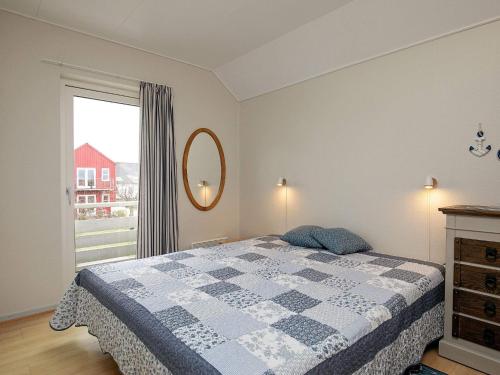 Postelja oz. postelje v sobi nastanitve Holiday home Rudkøbing XVII