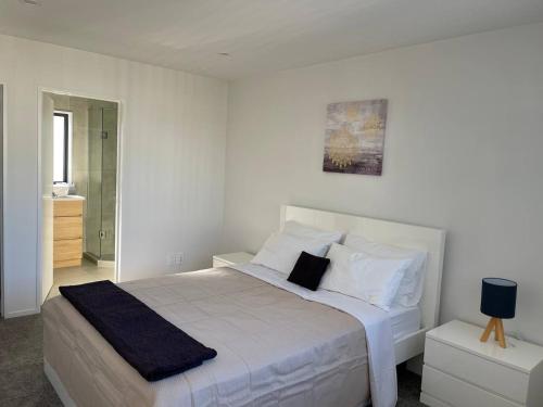 Vuode tai vuoteita majoituspaikassa 4 bedroom home fully furnished in Papakura, Auckland