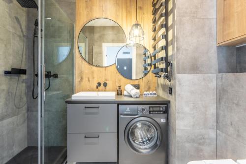 Et badeværelse på Ambria Apartments Platan Complex