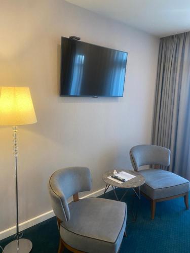 Hotel Residence Promenadeにあるテレビまたはエンターテインメントセンター