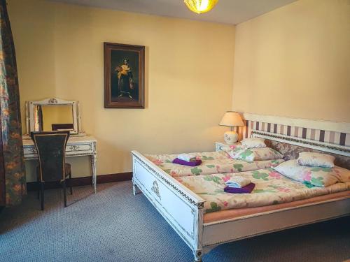 Postel nebo postele na pokoji v ubytování Apartamenty nad Wisłą Renesans