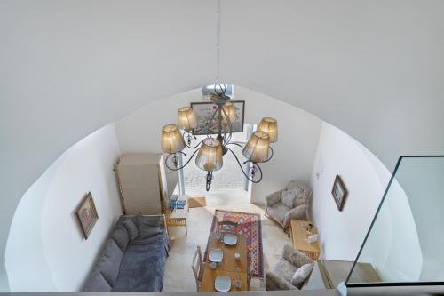 an overhead view of a living room with cardboard boxes at To Hani - Kamara Studio in Nicosia