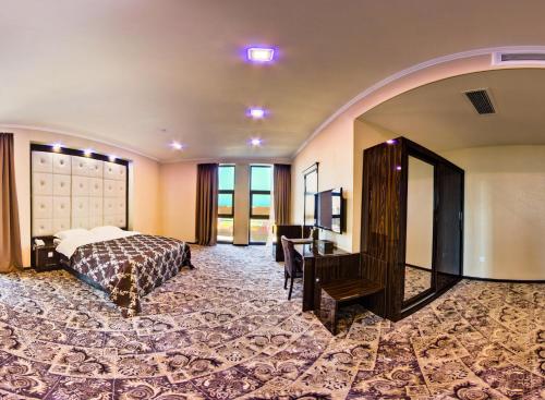 Postel nebo postele na pokoji v ubytování Plaza Hotel Bishkek