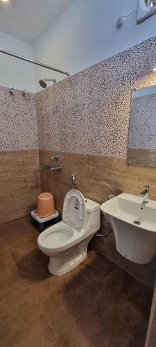 Koupelna v ubytování HOTEL SHREESH (NEIL)