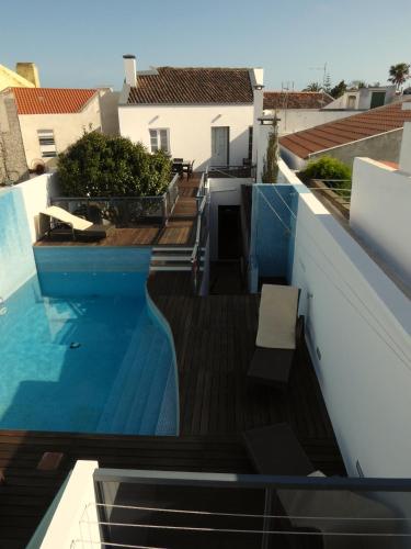 a swimming pool on the roof of a house at 2Stay - A1 in Ponta Delgada