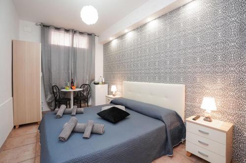 Postel nebo postele na pokoji v ubytování Guesthouse da Filiberto