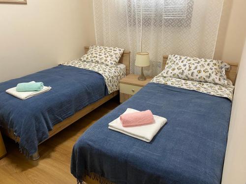 Postel nebo postele na pokoji v ubytování APP Vesna