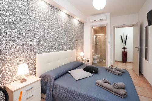 Postel nebo postele na pokoji v ubytování Guesthouse da Filiberto