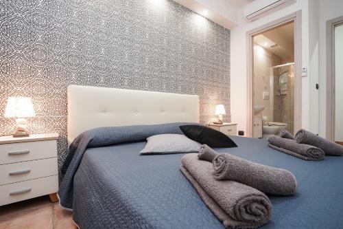Postel nebo postele na pokoji v ubytování Guesthouse da Filiberto