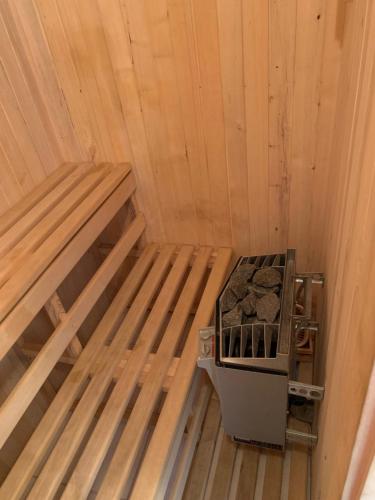 an inside view of a wooden cabin with a stove in it at Apartmán u Doktora in Banská Bystrica