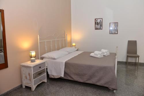 Posteľ alebo postele v izbe v ubytovaní Casa Liolà