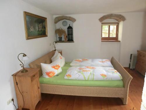 En eller flere senge i et værelse på Ferienwohnung mit Charme in Dresden Pillnitz