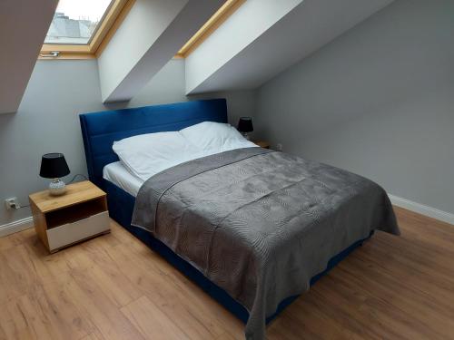 Postel nebo postele na pokoji v ubytování Marina Gdańsk