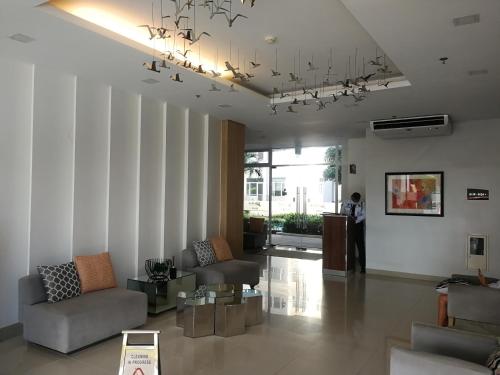 Posezení v ubytování SM South Residences, 1 bedroom with balcony.