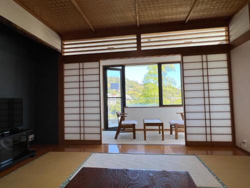 Foto de la galería de 熱海温泉　実の別荘 en Atami