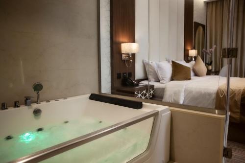 Katil atau katil-katil dalam bilik di Rio Hotel Olaya