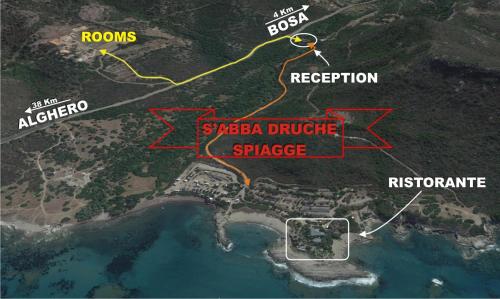 a satellite map of a resort with a map at S'Abba Druche rooms in Bosa