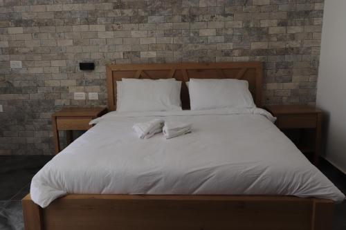 מיטה או מיטות בחדר ב-Oriental Nature