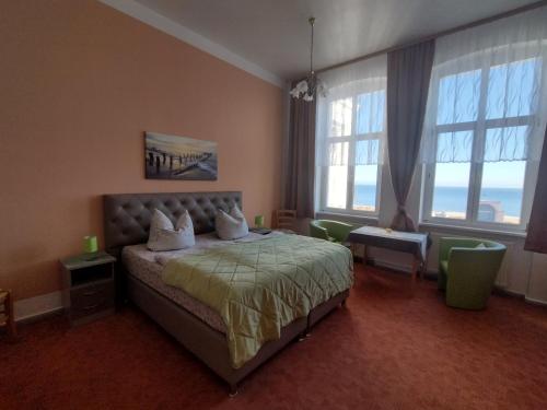 Postel nebo postele na pokoji v ubytování Villa Freya